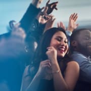 Company party DJ mixing music for employees