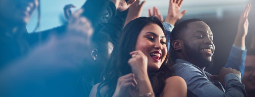 Company party DJ mixing music for employees