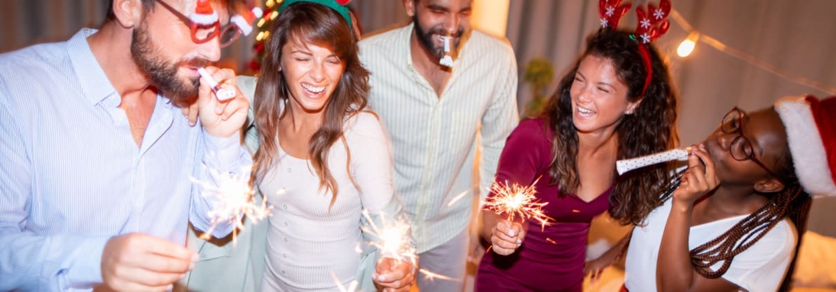 Professional DJ playing music at a company holiday event
