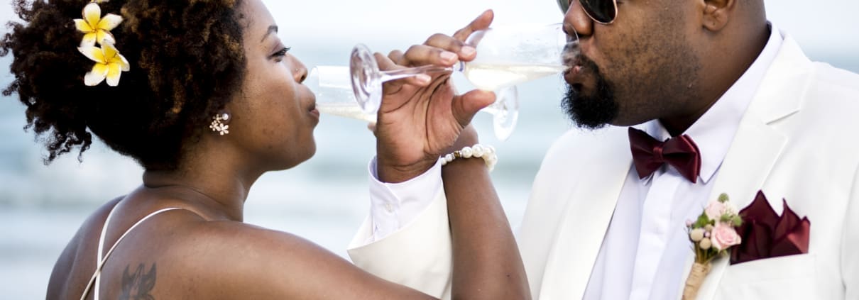 Couple raising a toast to getting married at a Branford CT wedding