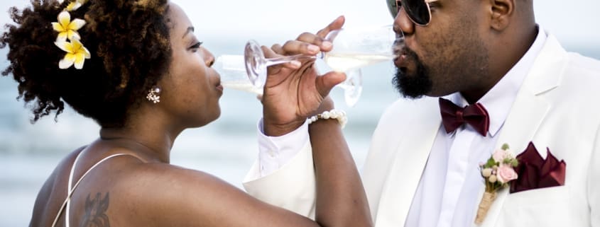 Couple raising a toast to getting married at a Branford CT wedding