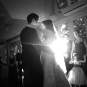Bride and groom dancing at an elegant Fairfield wedding reception with DJ lighting