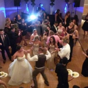 Bride and groom dancing at Guilford shoreline wedding with DJ entertainment