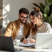 Engaged couple asking questions to a wedding DJ during consultation