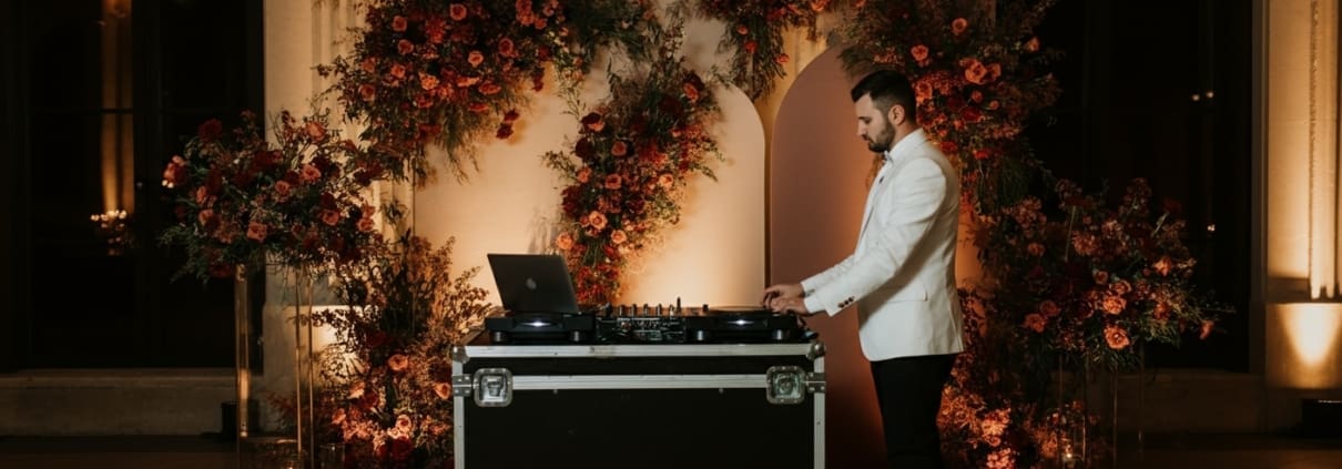 Wedding DJ setting up early in the day to prepare for the event
