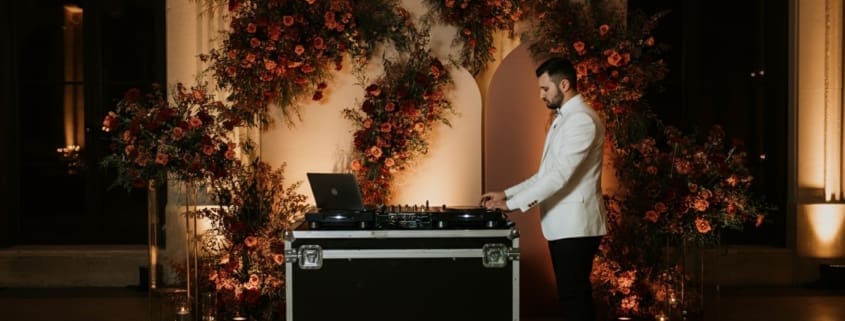 Wedding DJ setting up early in the day to prepare for the event