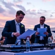 Wedding DJ helping keep the timeline on track with vendor coordination