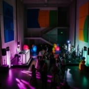 Wedding DJ and live band performing side by side at an upscale reception